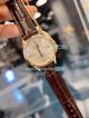 Omega Replica Ladies Watch Silver Dial Yellow Gold Bezel Brown Leather Strap 32mm (2)_th.jpg